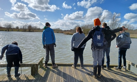Young people on Cambourne Nature Reserve by Rebecca Neal