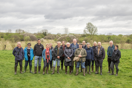 Large group smiling towards the camera at the Strawberry Hill Meeting WTBCN Natural England meeting