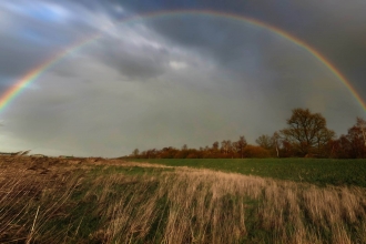 Rainbow over the Great Fen by Guy Pilkington