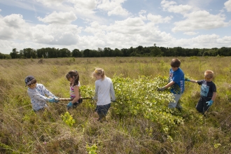 School children helping on a reserve 