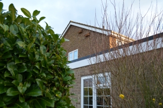 Swift boxes in place on the gable end of a house