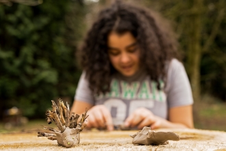 Teenager doing clay art