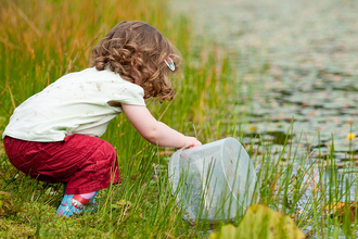 Child with bucket Ross Hoddinott/2020VISION