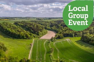 Birds-eye view of Hexton Manor Estate on a sunny day