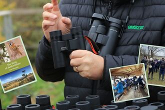 Man holding binoculars