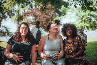 Women sitting together by Samuel Peter from pexels.com