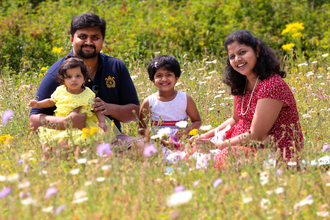 Family in Meadow - Jon Hawkins/Surrey Hills Photography