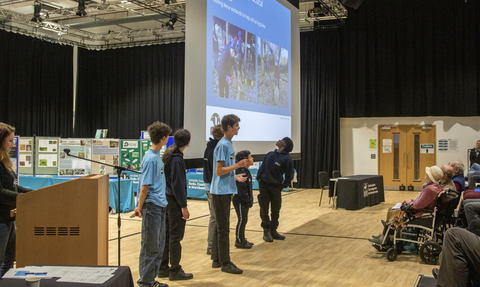 Six members of our Young People's Forum presenting at the 2023 Members' Day and AGM