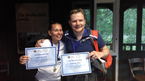 Two participants of the Rothschild Way Challenge 2017 hold up their certificates