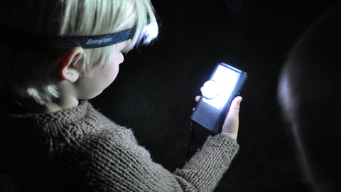 Child with bat detector