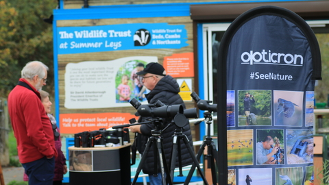 Opticron stand with binoculars outside Summer Leys centre