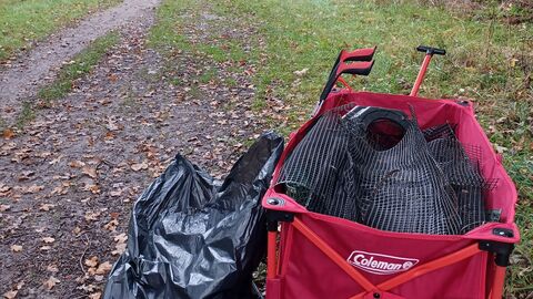 Trolley and rubbish bag on Cambourne Nature Reserve by Rebecca Neal
