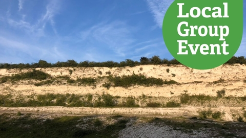 Sun shining on the chalk cliff at East pit, "Local Group event" icon overlaid