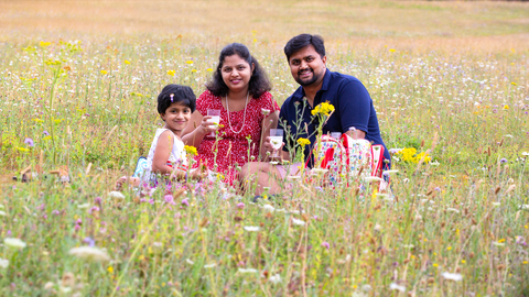 Family picnic in the meadow by Jon Hawkins- Surrey Hills Photography