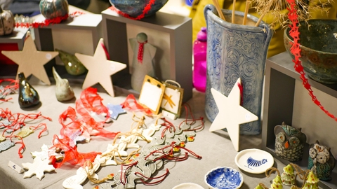 A variety of pots and festive decorations on a table