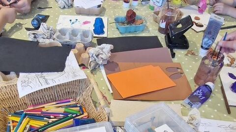 table photo filled with craft materials
