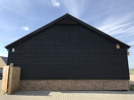 The Trumpington swift box installed and almost invisible against the cladding of the building