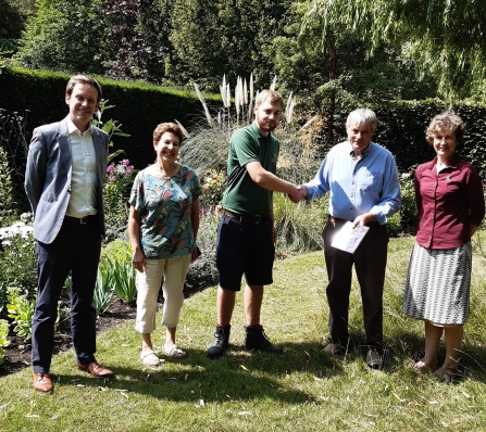 Wildlife Gardening Judge Bernard Hunt and Sue Barnard from the Wildlife Trust BCN awarding first prize to Downing College