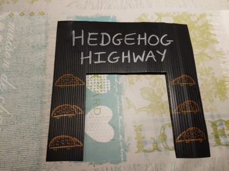 Hedgehog highway sign by Rebecca Neal