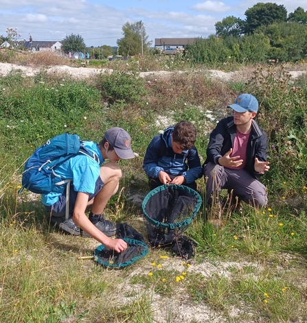 Forum members Alex and Callum at a Pegsdon butterfly bank with trustee Matt