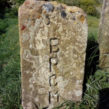 Concrete post marking boundary of BPCM
