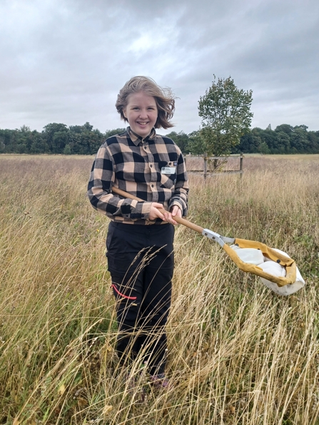 Work experience Emily with sweep net at Trumpington Meadows