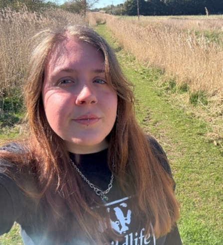 Kaitlyn YPF member standing outside in the sun
